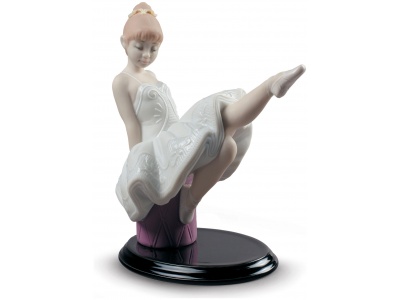 The essay begins Girl Figurine